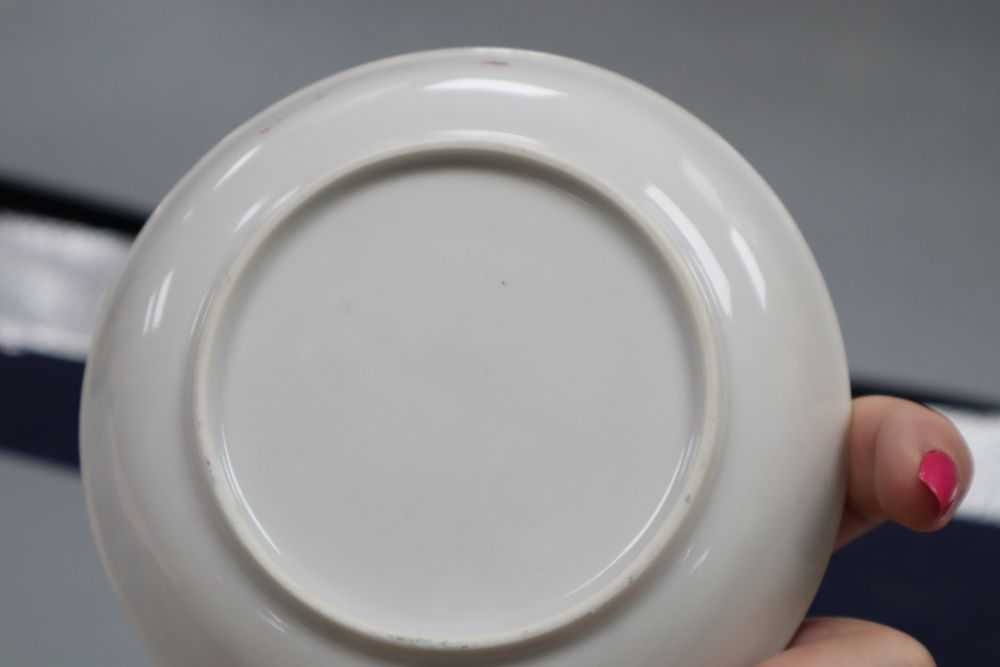 A Chinese famille rose tea bowl and saucer